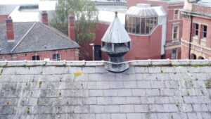 A chimney on the roof of a building.