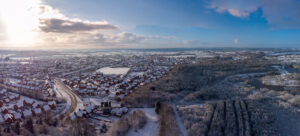 An aerial view of a snow covered town.